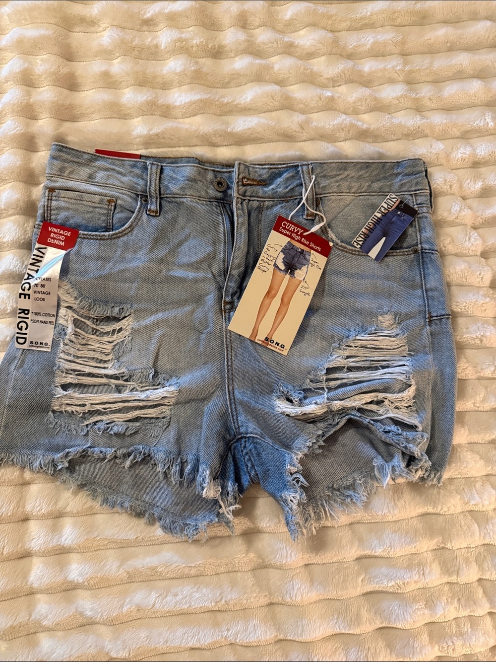 Distressed Curvy High-Rise Light Blue Denim Shorts